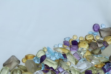 Several colour and kind of gems stone om white background