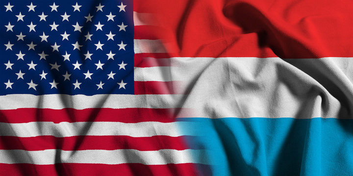 National flag of the United States with Luxembourg on a waving cotton texture background