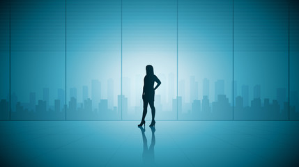 Silhouette business woman standing in building looking at cityscape view on blue color background