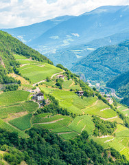 Fototapeta premium Panoramic view from Sabiona Monastery near Chiusa on a summer morning, Province of Bolzano, Trentino Alto Adige, Italy.