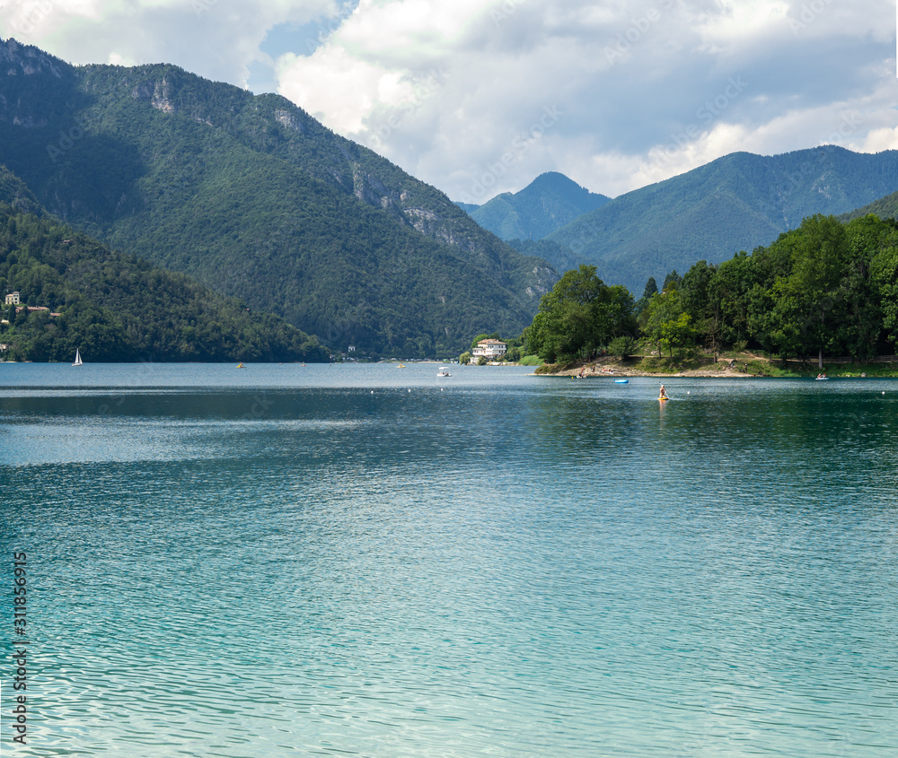 Wall mural ledro, italy. the ledro lake is a natural alpine lake. amazing turquoise, green and blue colors. ita