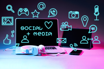 Laptip and touch pad with social media icons.