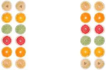 multi-colored citrus slices on a white background