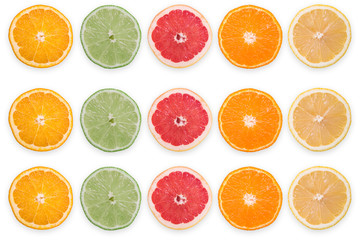 multi-colored citrus slices on a white background