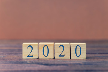 2020 on wooden cubes, blue