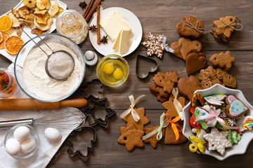 Cooking a delicious cake on table on a wooden background.