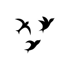 A flock of birds. flying black swallows on a white background. Tattoo, print on t-shirt, autumn, spring, sky.
