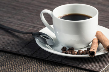 Cup of espresso coffee on wooden table
