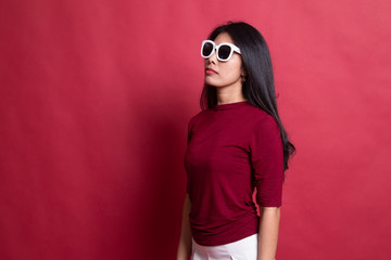 Portrait of a beautiful young asian girl in sunglasses.