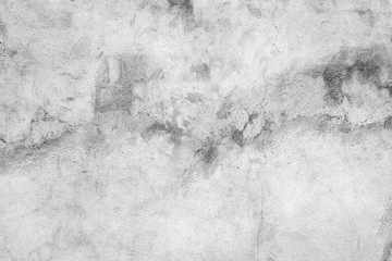 Naklejka premium Texture of a concrete wall with cracks and scratches which can be used as a background