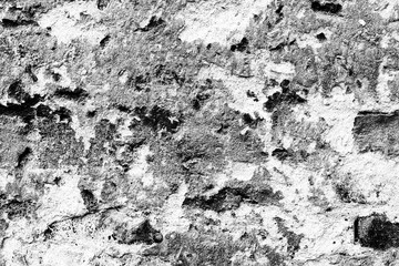 Texture of a brick wall with cracks and scratches which can be used as a background