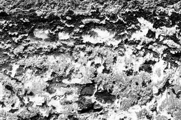 Texture of a brick wall with cracks and scratches which can be used as a background