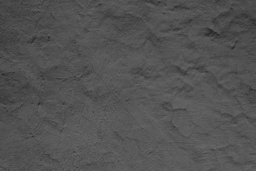 Texture of a concrete wall with cracks and scratches which can be used as a background