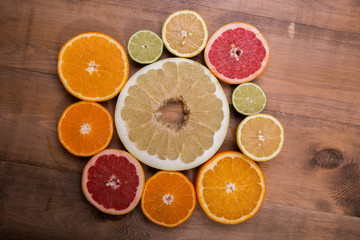 citrus slide on wooden background