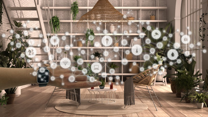 Woman wearing a smart watch, arm, wrist, geometric background with connected line and dots showing internet of things system, home automation concept over conservatory, winter garden