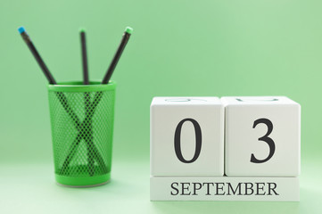 Desk calendar of two cubes for September 3