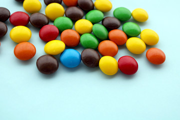 colorful candies on color background
