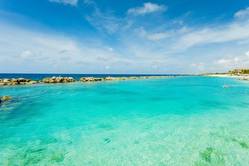 Turquoise sea water and blue sky. Curacao island.. Beautiful nature background.