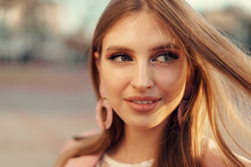 Fototapeta premium Close up portrait of a woman walking in the street