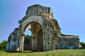 Ruins of a medieval stone church next to the town of Magliano in Toscana, Italy..