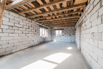 Russia, Moscow- August 05, 2019: interior room rough repair for self-finishing. interior decoration, bare walls of the room, stage of construction