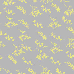 Seamless pattern of yellow leaves on a gray background. Vector graphics.