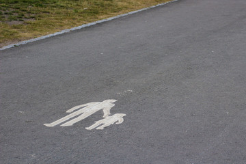 Paved walkway with pedestrian symbol