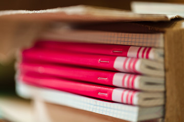 Cardboard sheets pack on a shelf of warehouse