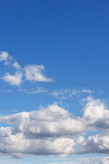 Naklejka na ściany i meble Blue sky background. Beautiful sky with white clouds