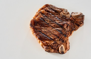 Grilled or barbecued marinated cowboy steak