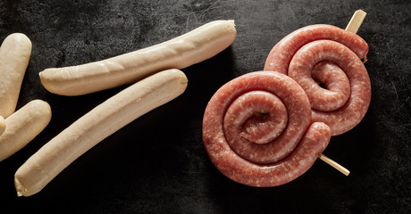 Assorted uncooked pork and beef sausages