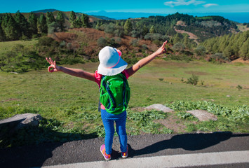 happy little girl enjoy hiking in nature, family travel