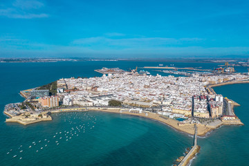 Panoramic aerial view of the city of Cadiz and the Castle of San Sebastian. Spain - obrazy, fototapety, plakaty