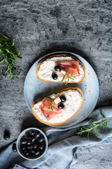 Slices of bread with creamy spread made from Feta cheese, horseradish and sour cream, served with...