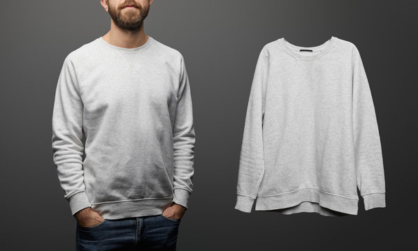 Cropped View Of Bearded Man Near Blank Basic Grey Sweatshirt On Black Background