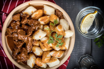 Beef stew with potatoes dumplings.