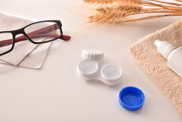 Various elements for vision correction on cream table elevated view
