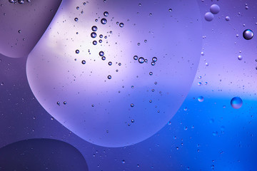 Beautiful abstract blue and purple color background from mixed water and oil