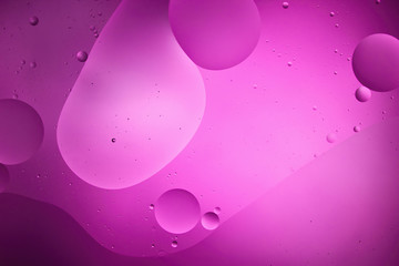 Beautiful pink color abstract background from mixed water and oil