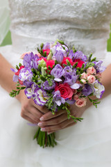 wedding bouquet of flowers in the hands of the bride, wedding
