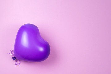 Purple ballon on purple background.
