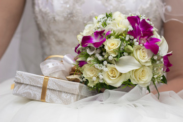 wedding bouquet of flowers in the hands of the bride, wedding