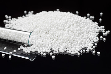 Closeup of a white plastic polymer in granules