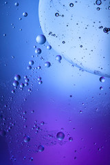 creative abstract blue and purple color background from mixed water and oil
