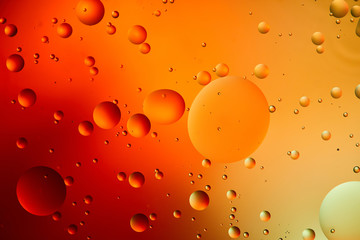 abstract orange and red color background from mixed water and oil