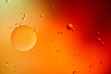 orange and red color abstract background from mixed water and oil