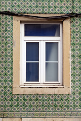old window on a wall, lissabon, portugal