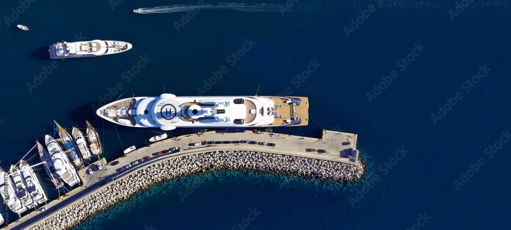 Wall mural aerial drone top down ultra wide photo of mediterranean port with yachts docked