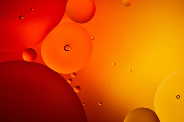 abstract macro orange and red color background from mixed water and oil