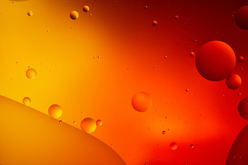 creative abstract orange and red color background from mixed water and oil